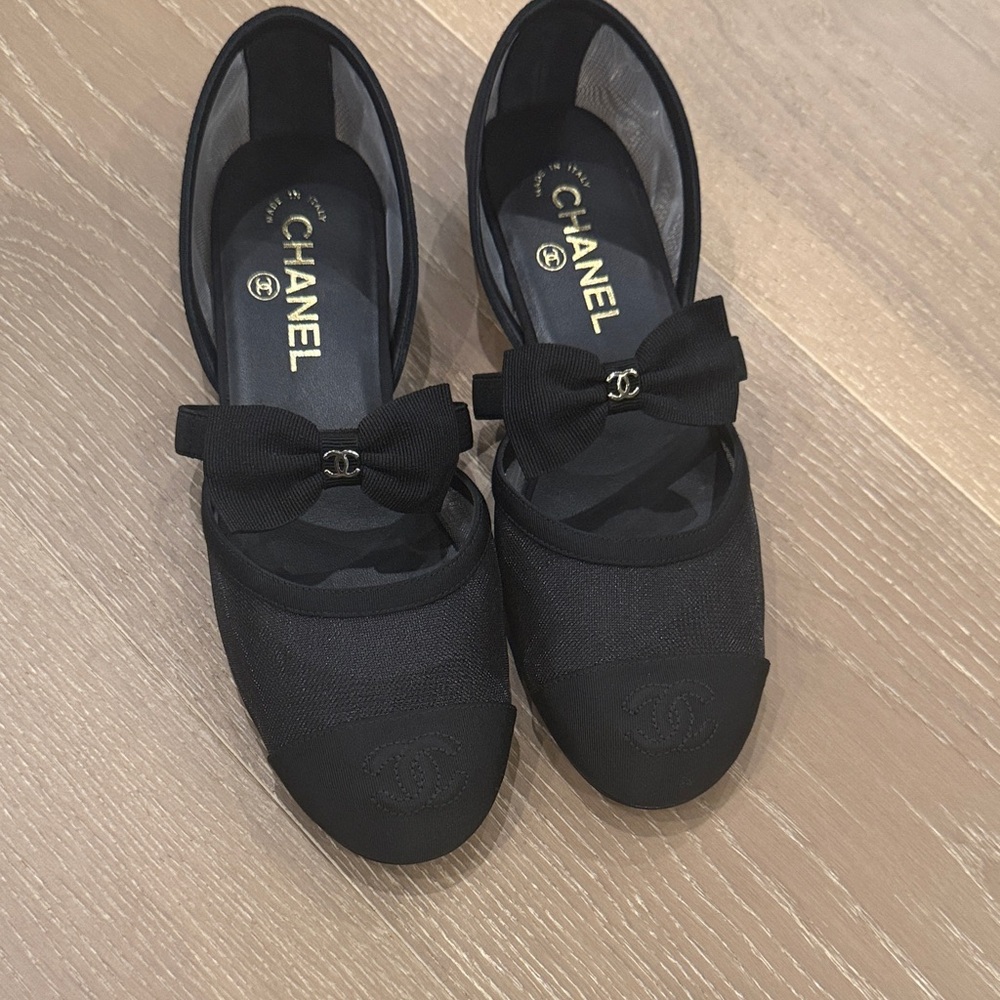CHANEL Black Mesh Flats with Bow Accent